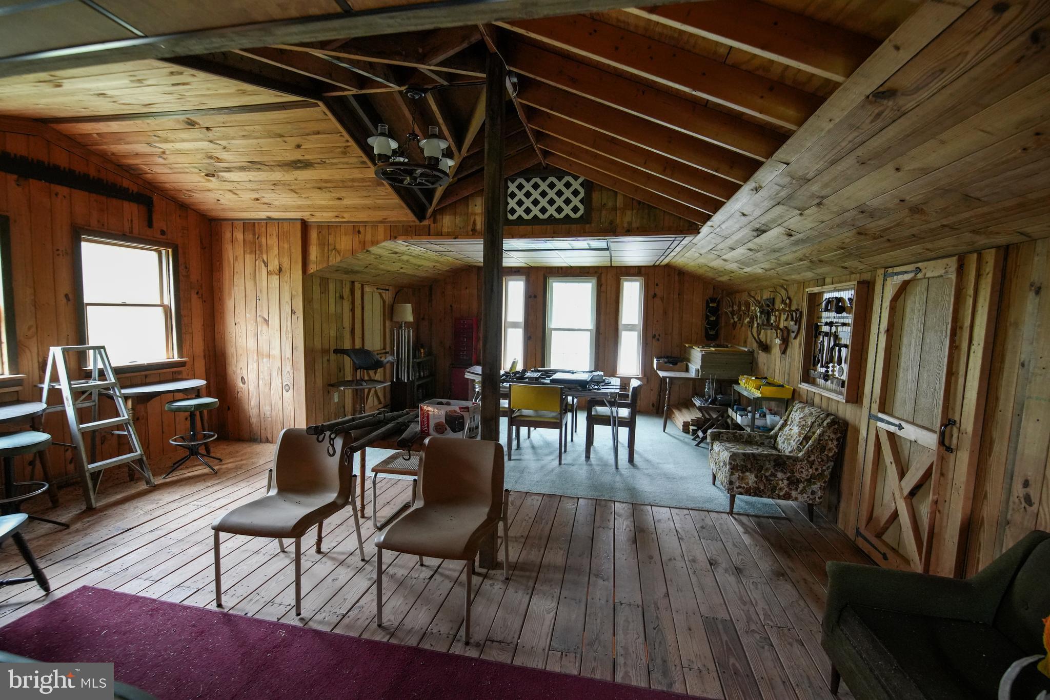 1315 1st Fork Road Austin, PA 16720 - Photo 23 of 25 a view of a dining room with furniture window and wooden floor