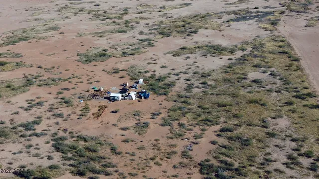a view of a beach with a mountain view