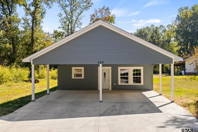 a view of a house with a swimming pool