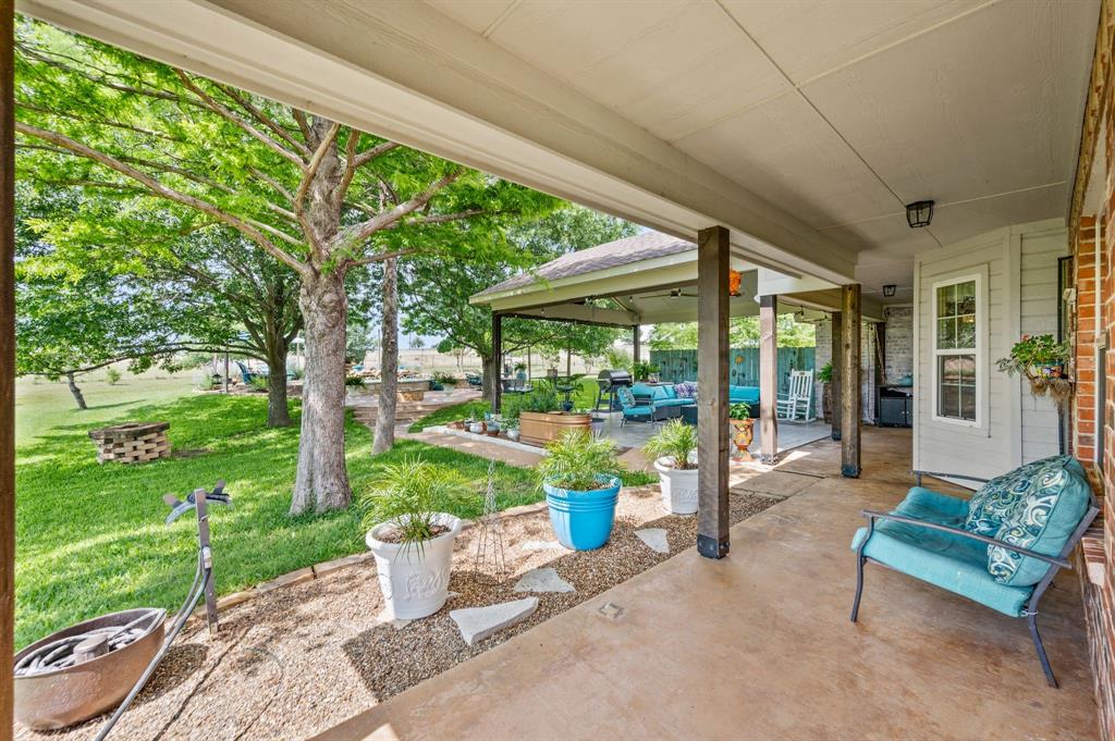 2141 Old Denton Road Decatur, TX 76234 - Photo 28 of 40 Covered back patio