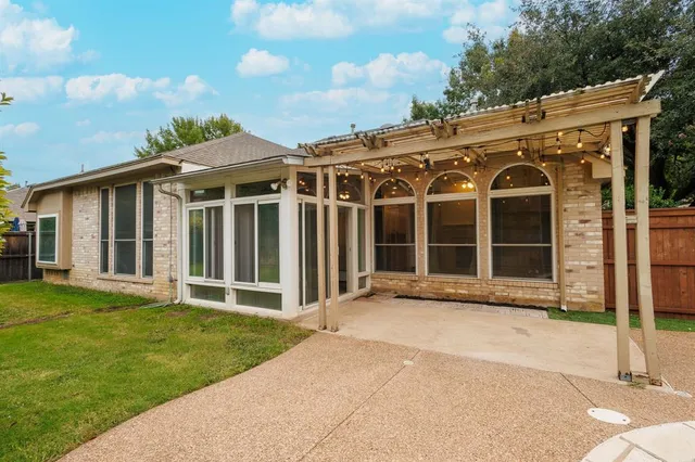 a view of a house with a garden