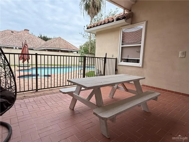 a view of a chairs setting on the roof deck