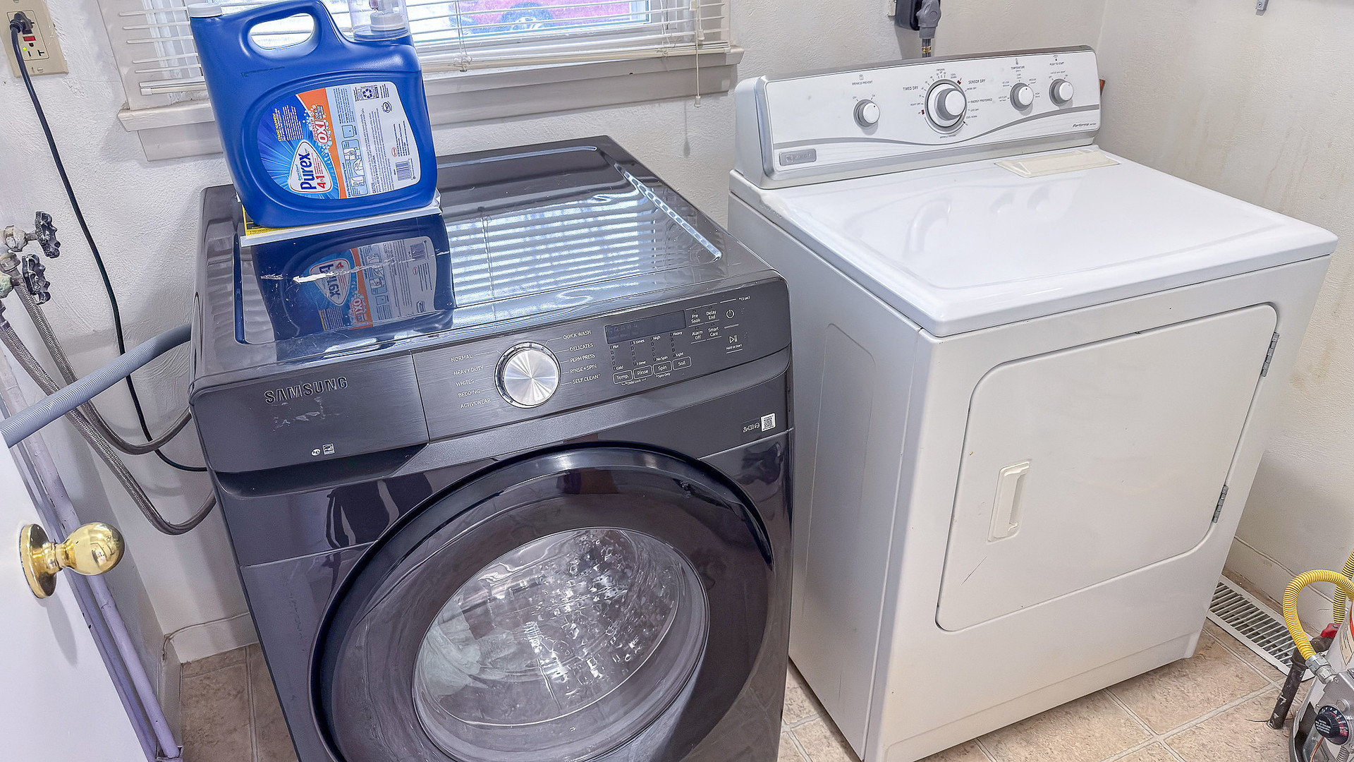 1709 West William Street Champaign, IL 61821 - Photo 19 of 20 a utility room with dryer and washer
