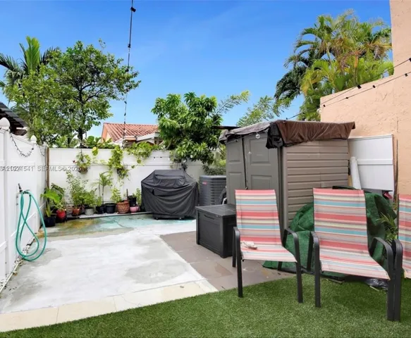 a house view with a garden space