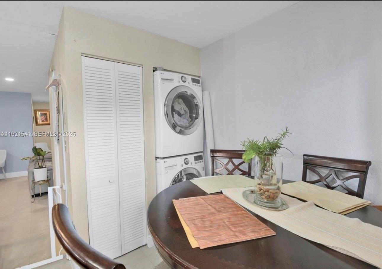 550 Southwest 115th Avenue, Unit 306F Sweetwater, FL 33174 - Photo 7 of 16 a living room with furniture and wooden floor