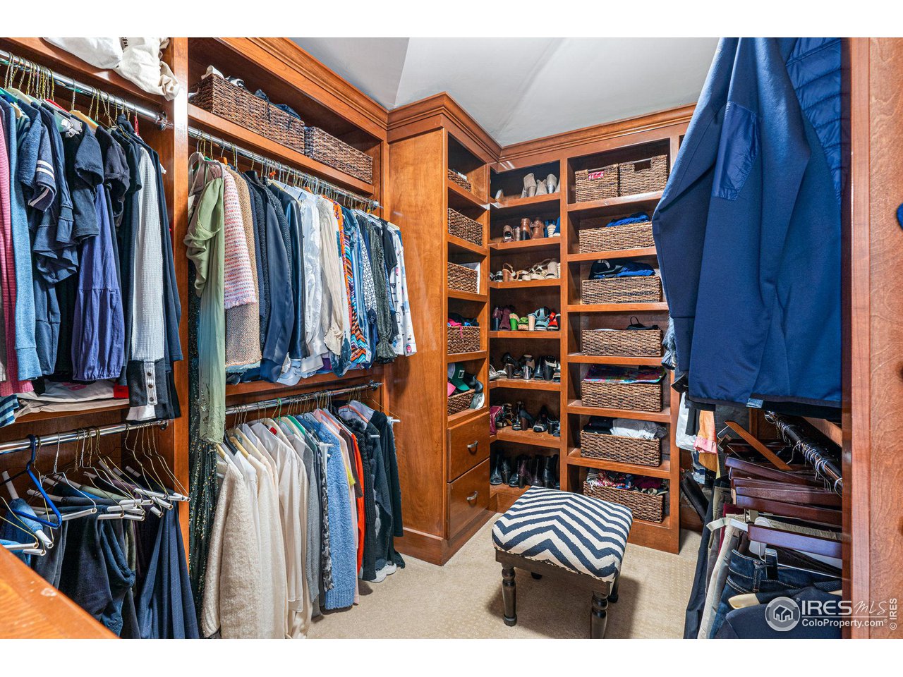 800 Grant Place Boulder, CO 80302 - Photo 25 of 40 Two master suite custom walk-in closets with custom cherry cabinetry