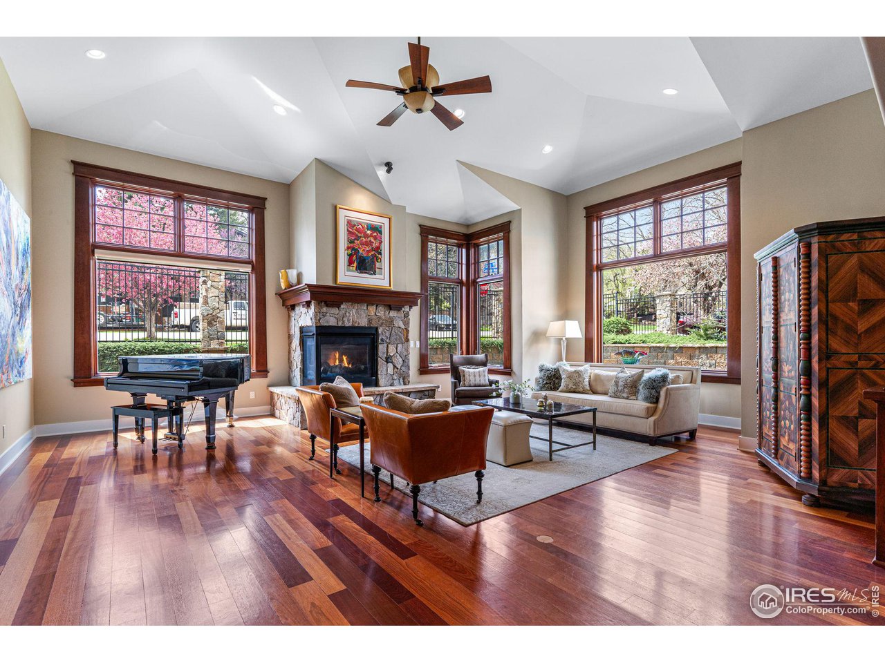 800 Grant Place Boulder, CO 80302 - Photo 6 of 40 Living room with expansive windows capturing the iconic Flatirons views