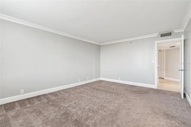 a view of an empty walk in closet