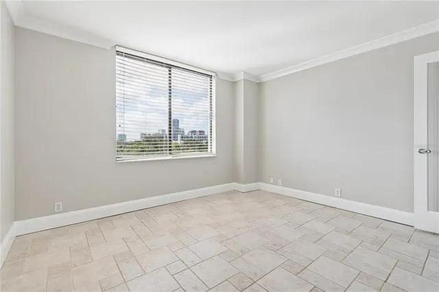 a bathroom with a toilet sink and shower