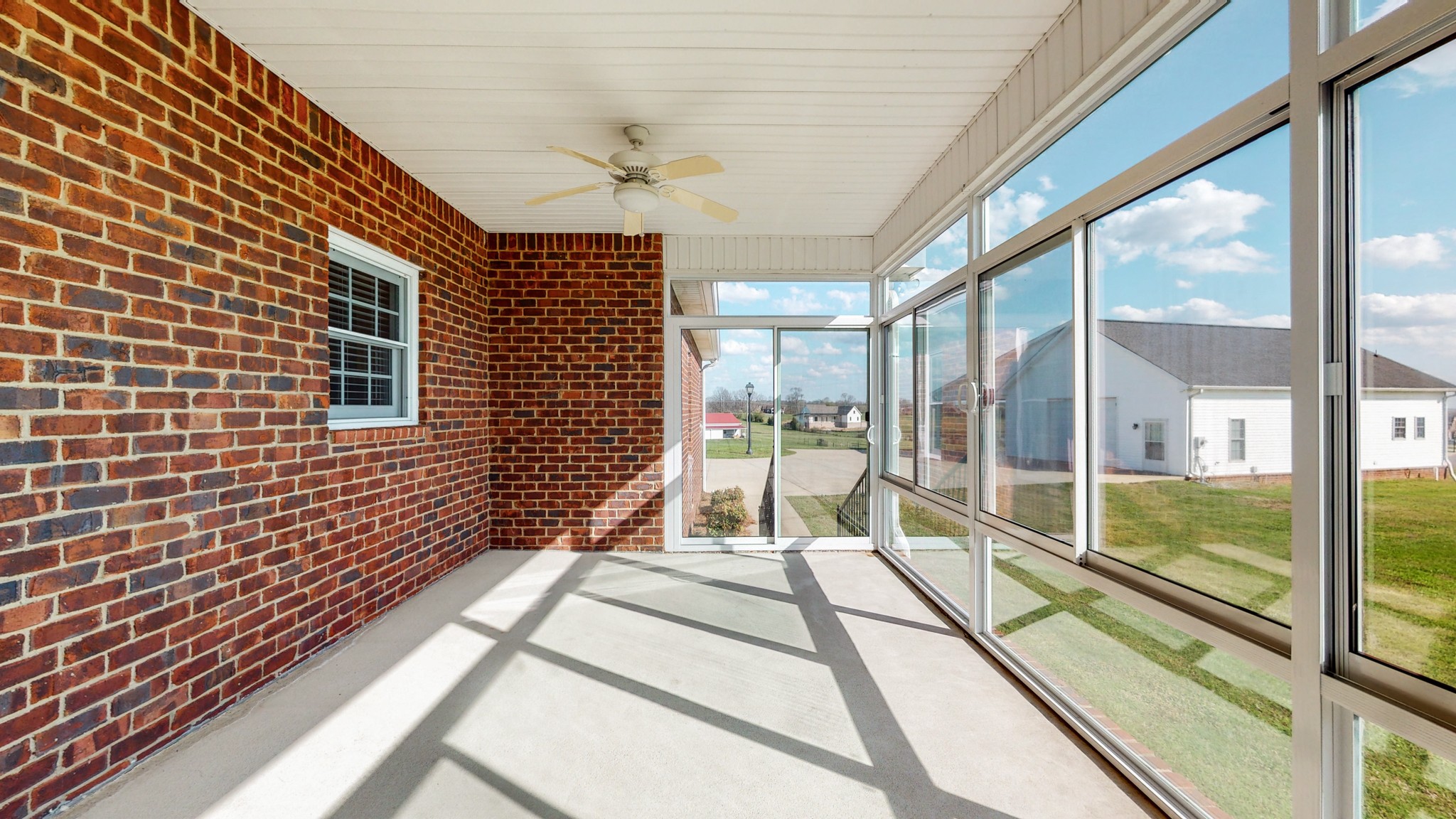 2996 South Rutland Road Mount Juliet, TN 37122 - Photo 24 of 37 a view of a balcony with a large window and wooden floor