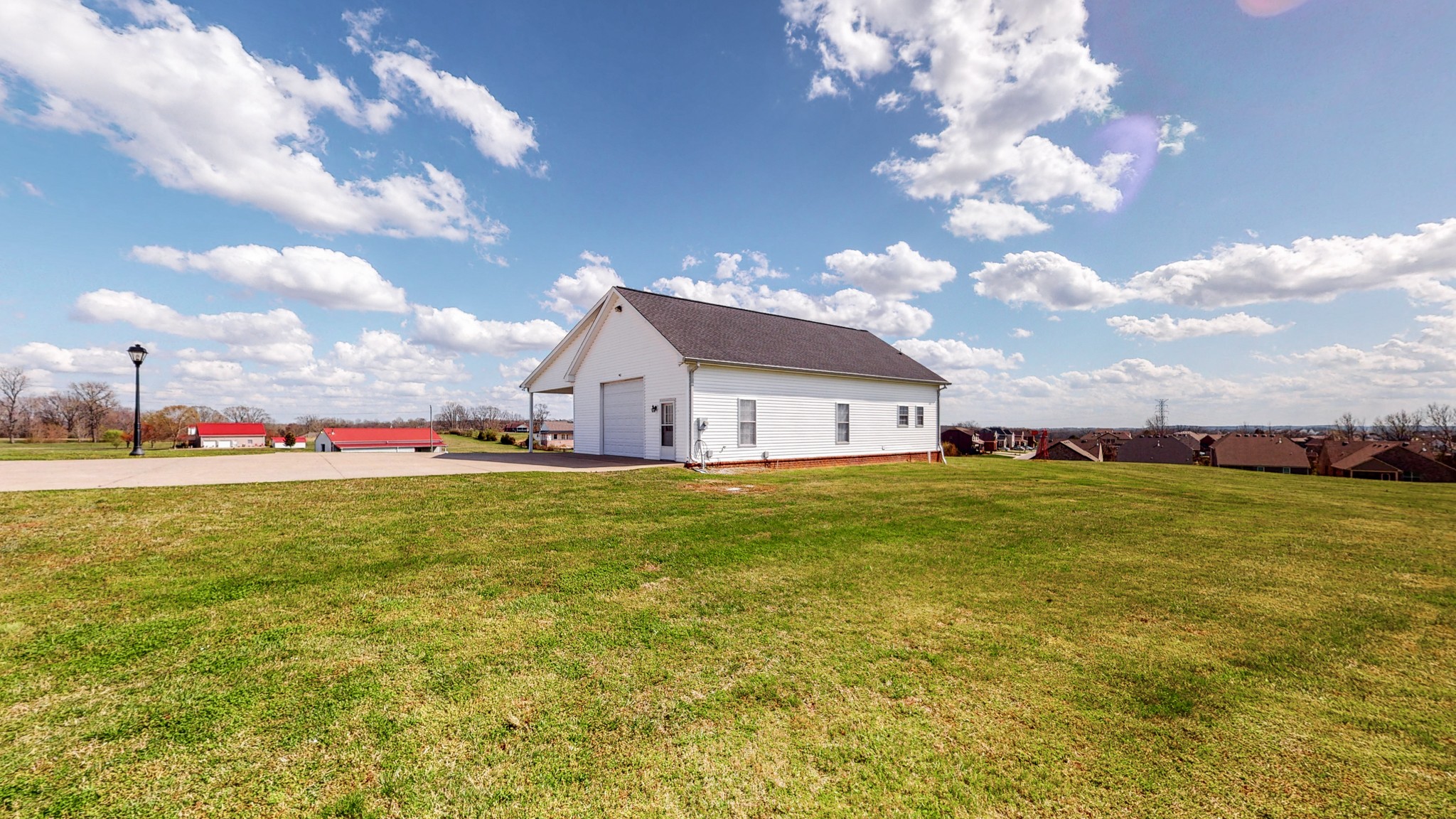 2996 South Rutland Road Mount Juliet, TN 37122 - Photo 26 of 37 a view of a house with a big yard