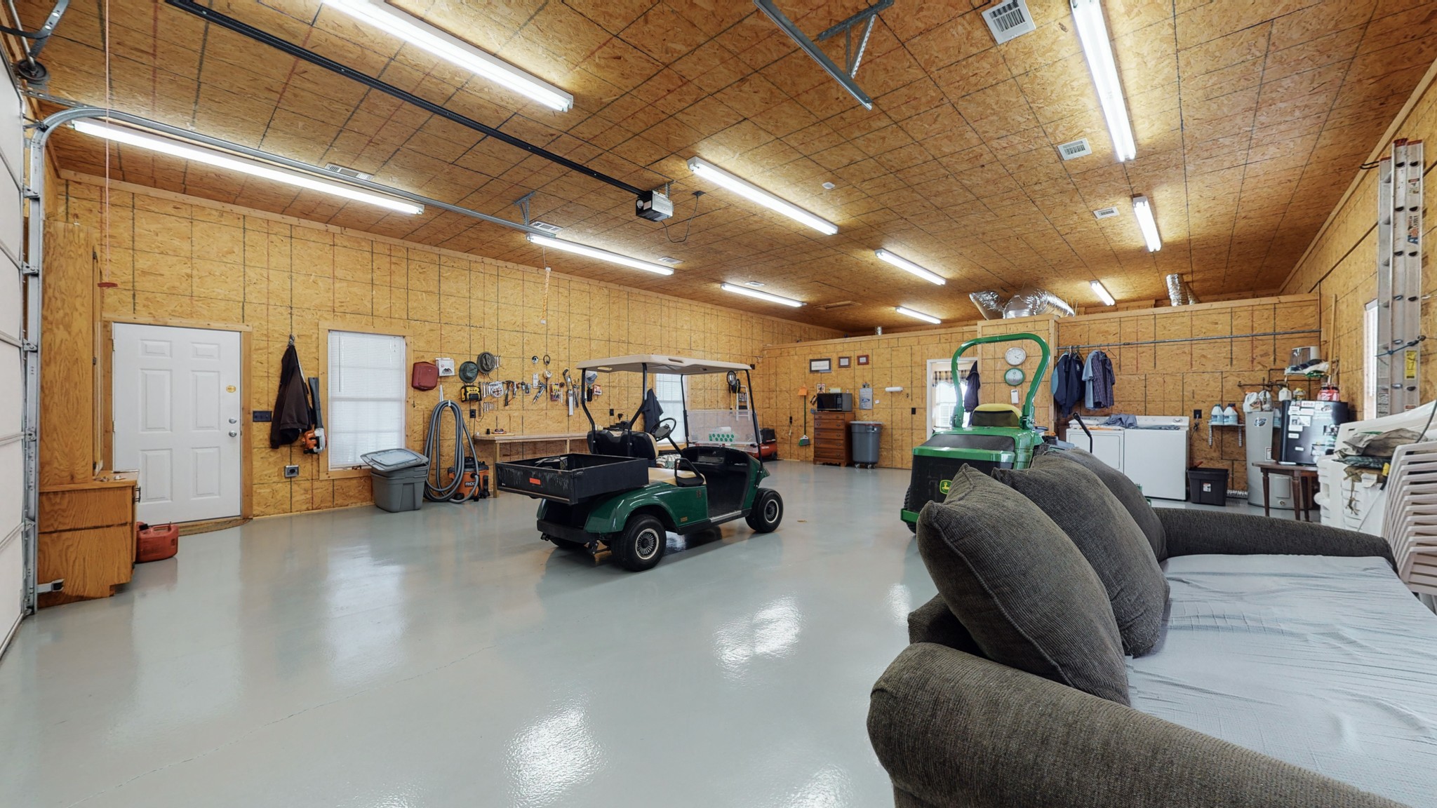 2996 South Rutland Road Mount Juliet, TN 37122 - Photo 28 of 37 a living room with furniture and a chandelier