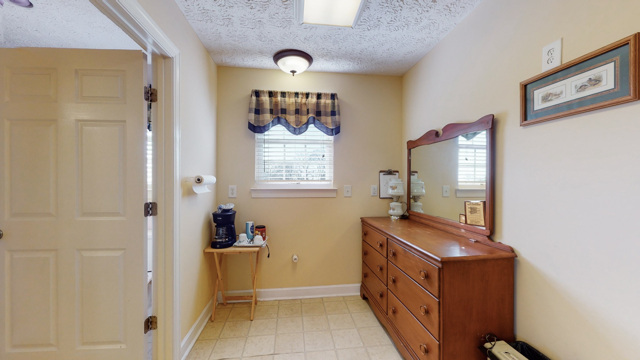2996 South Rutland Road Mount Juliet, TN 37122 - Photo 32 of 37 a bathroom with a sink and a mirror