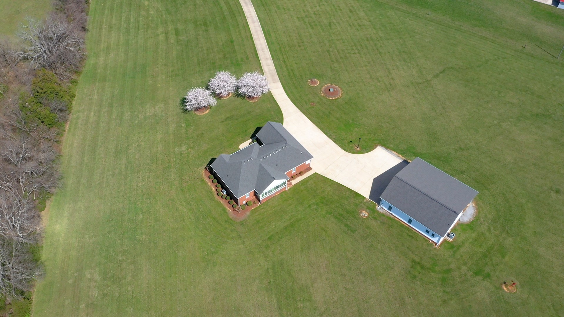 2996 South Rutland Road Mount Juliet, TN 37122 - Photo 36 of 37 an aerial view of a house with a yard