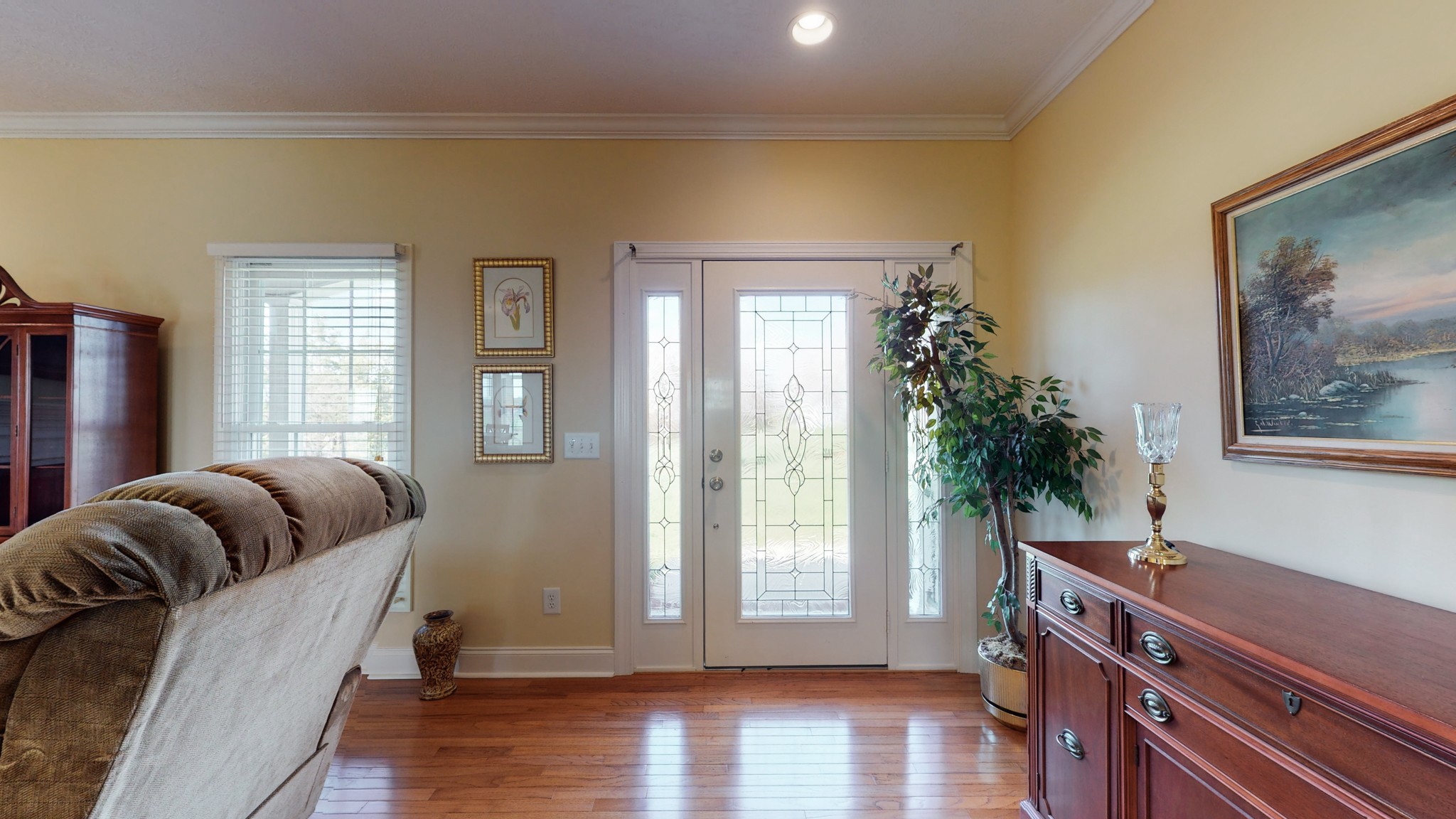 2996 South Rutland Road Mount Juliet, TN 37122 - Photo 7 of 37 a living room with furniture and a wooden floor