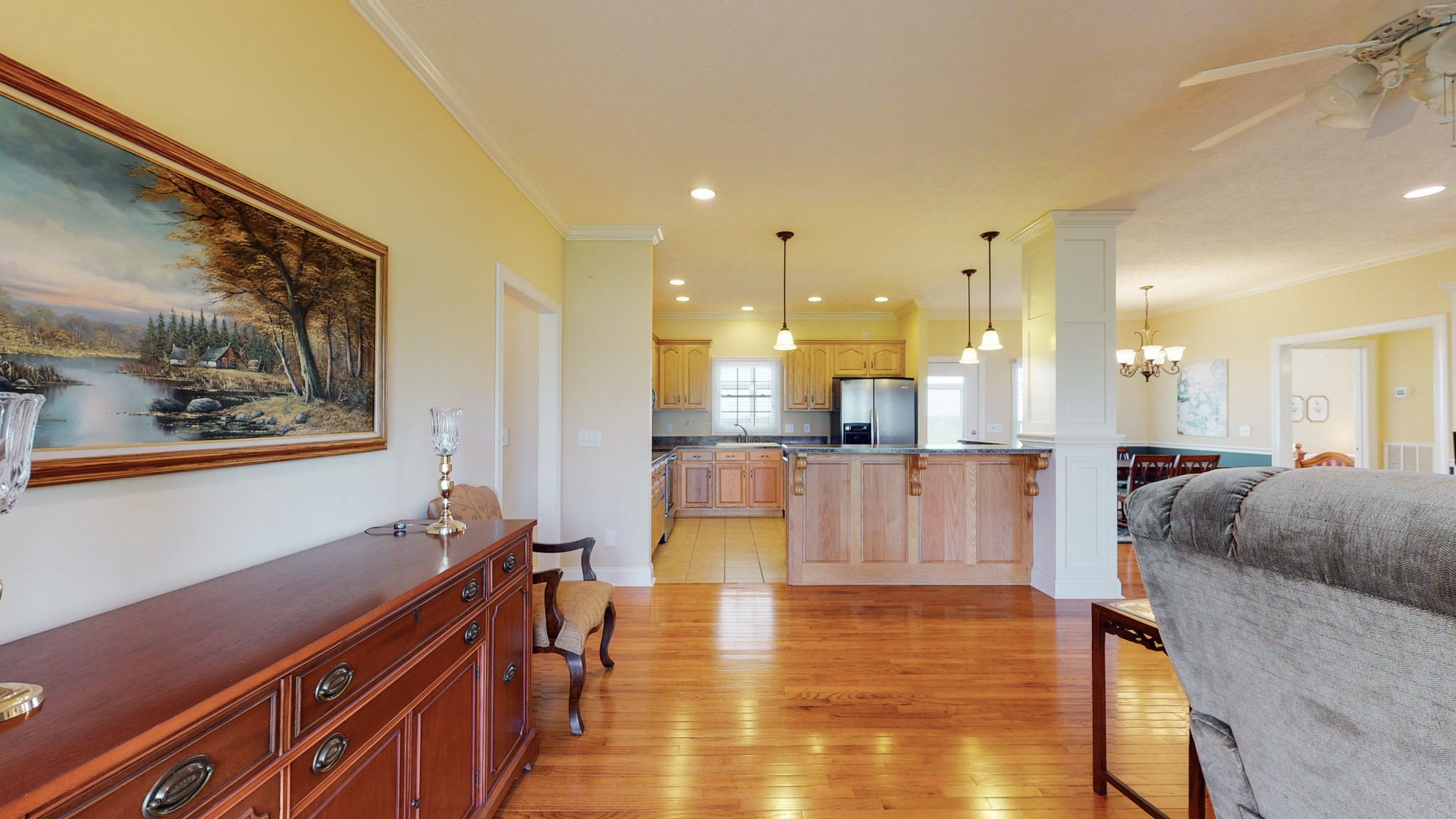 2996 South Rutland Road Mount Juliet, TN 37122 - Photo 9 of 37 a living room with furniture and kitchen view