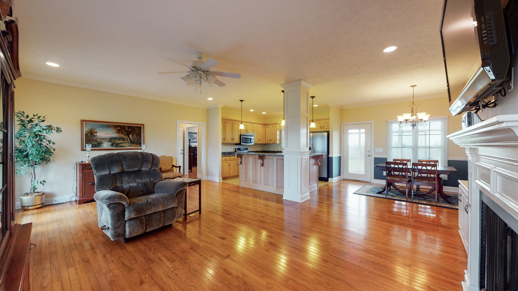 2996 South Rutland Road Mount Juliet, TN 37122 - Photo 10 of 37 a living room with furniture or kitchen and a wooden floor