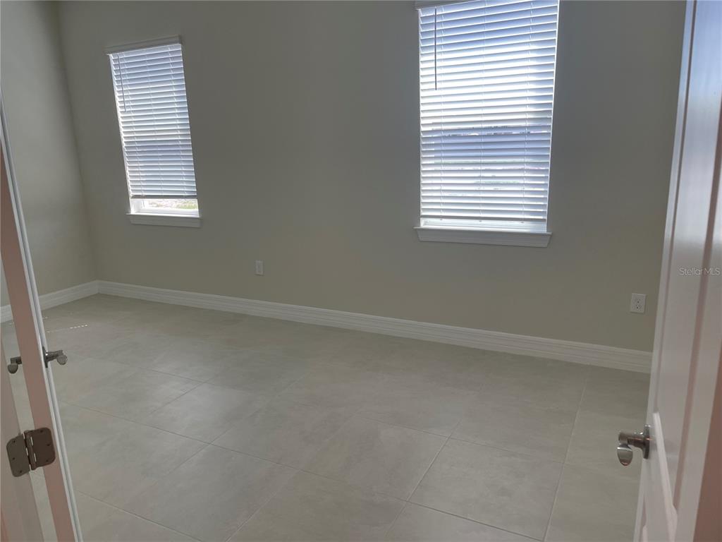 8375 Fenton Street Orlando, FL 32836 - Photo 11 of 29 an empty room with a window
