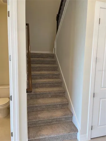 a view of entryway with a white door