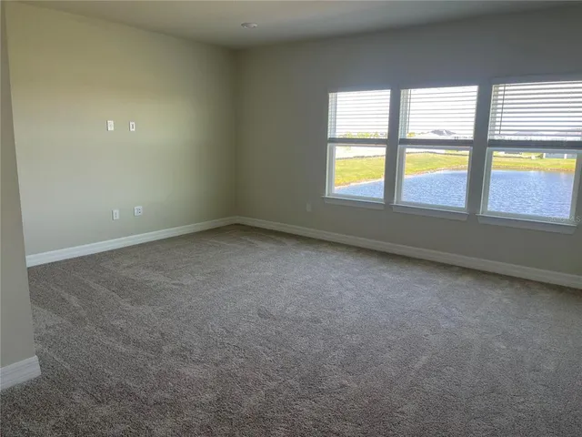 an empty room with window