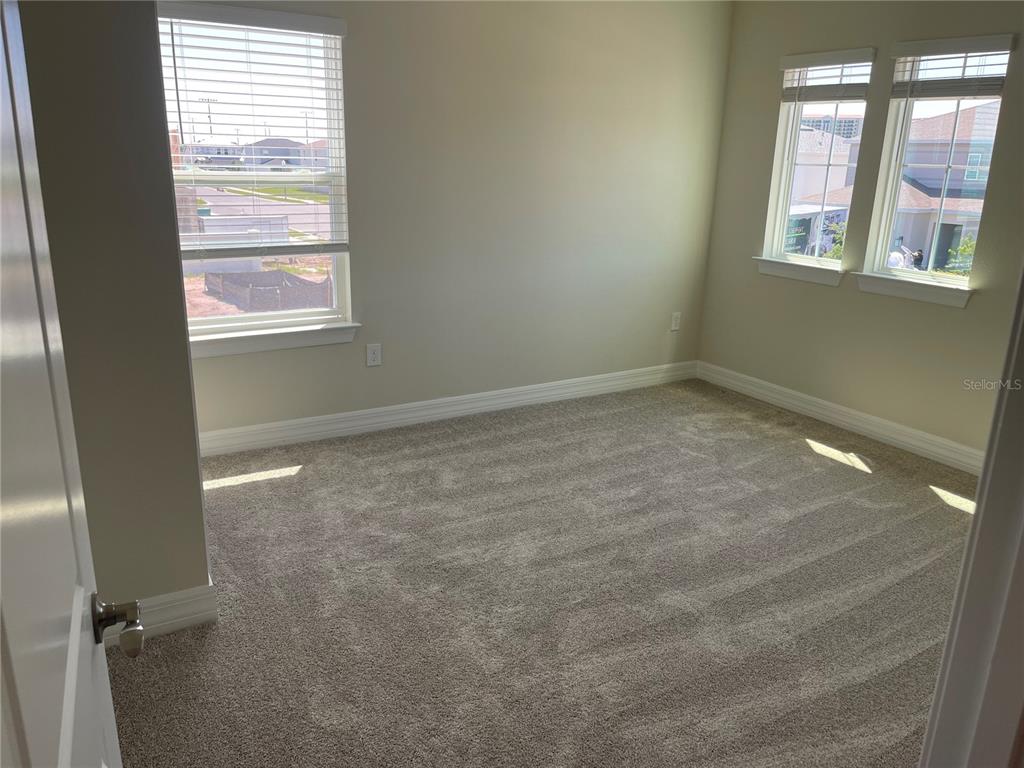 8375 Fenton Street Orlando, FL 32836 - Photo 27 of 29 a view of an empty room with a window