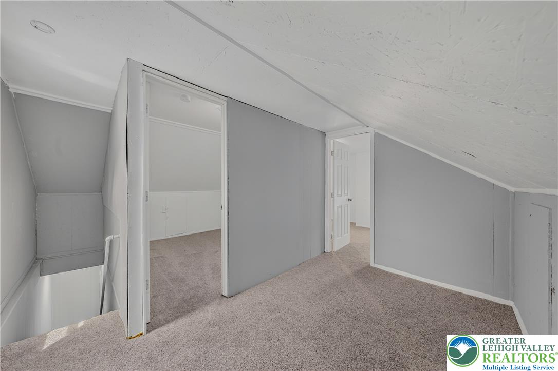313 Main Street Slatington, PA 18080 - Photo 56 of 73 An inviting attic retreat with fresh carpeting and ample potential.