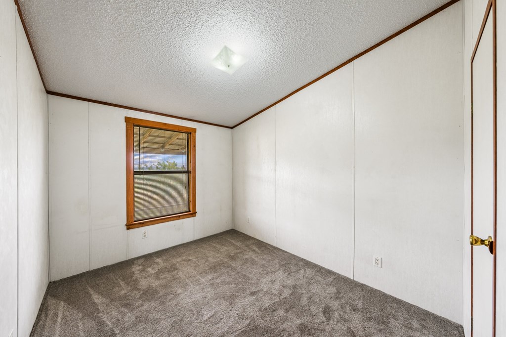 3526 Stapp Ranch Road Harper, TX 78631 - Photo 17 of 30 an empty room with windows
