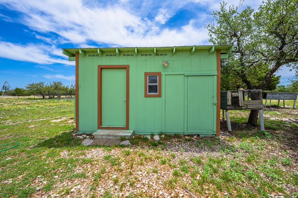 3526 Stapp Ranch Road Harper, TX 78631 - Photo 23 of 30 a view of a back yard of the house