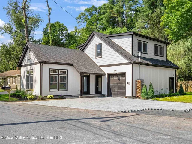 front view of a house and a yard