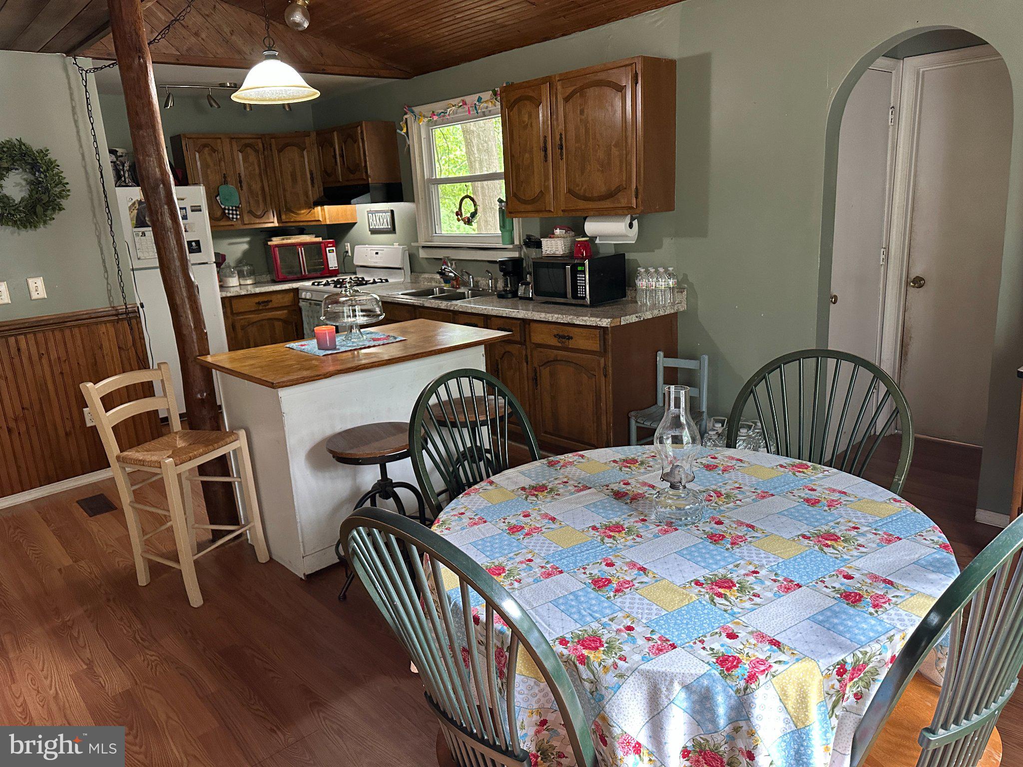 28403 Old Eden Road Eden, MD 21822 - Photo 28 of 46 a view of a dining room with furniture and wooden floor