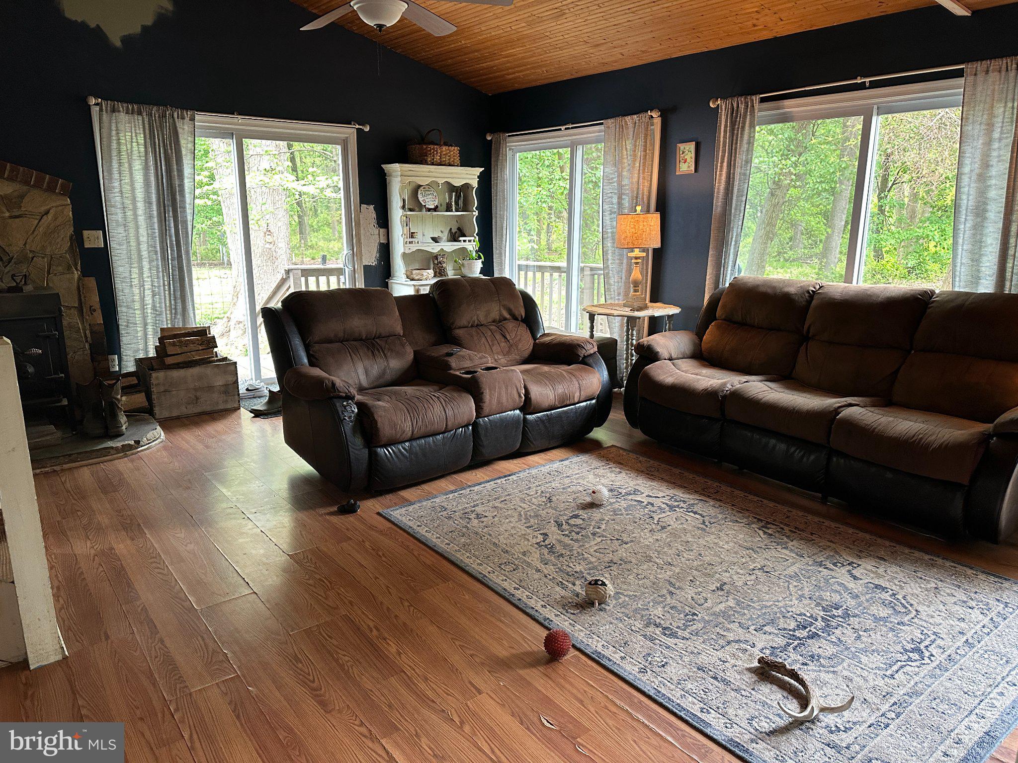 28403 Old Eden Road Eden, MD 21822 - Photo 36 of 46 a living room with furniture and large windows