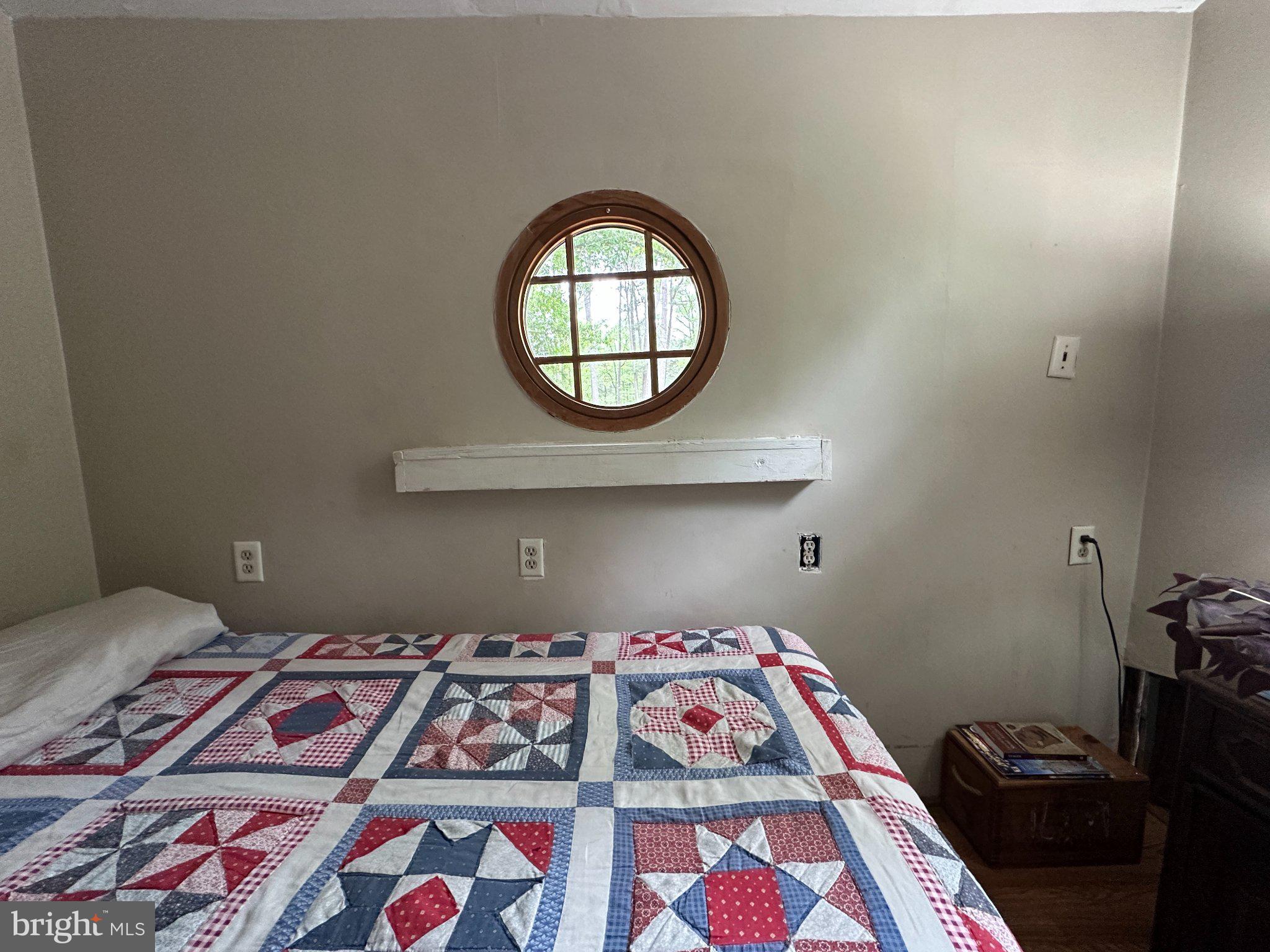 28403 Old Eden Road Eden, MD 21822 - Photo 38 of 46 a bedroom with a bed and a painting on the wall