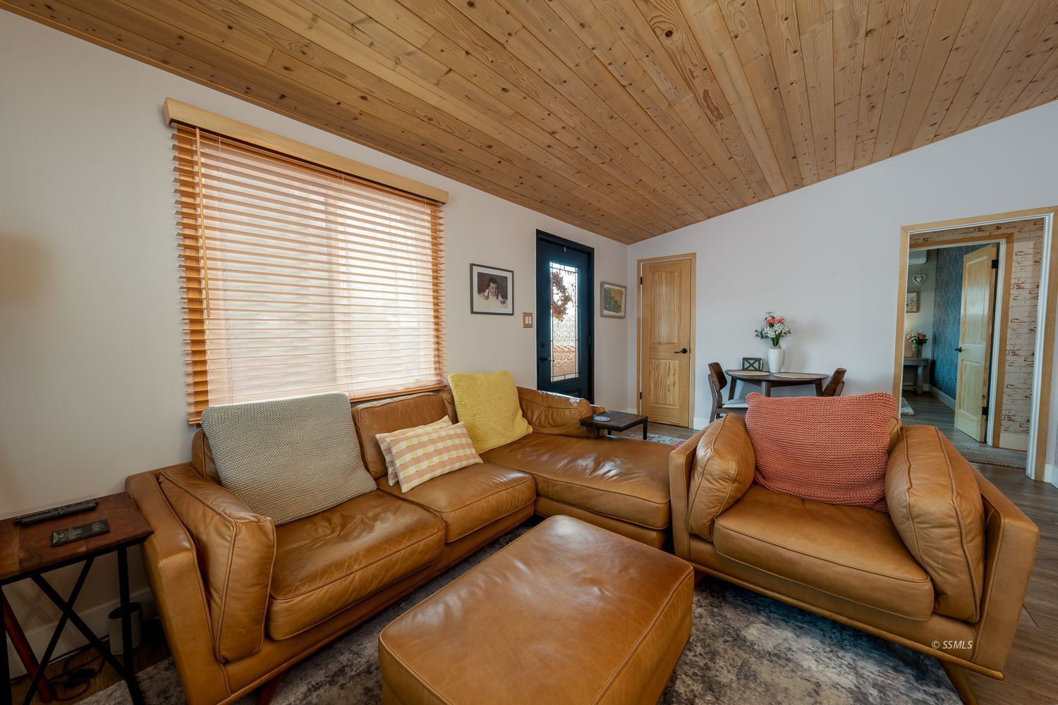 413 North Helena Street Ridgecrest, CA 93555 - Photo 4 of 42 a living room with furniture and a large window