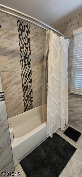 46 Cumberland Avenue, Unit 2 Verona, NJ 07044 - Photo 14 of 25 a bathroom with a bathtub and shower