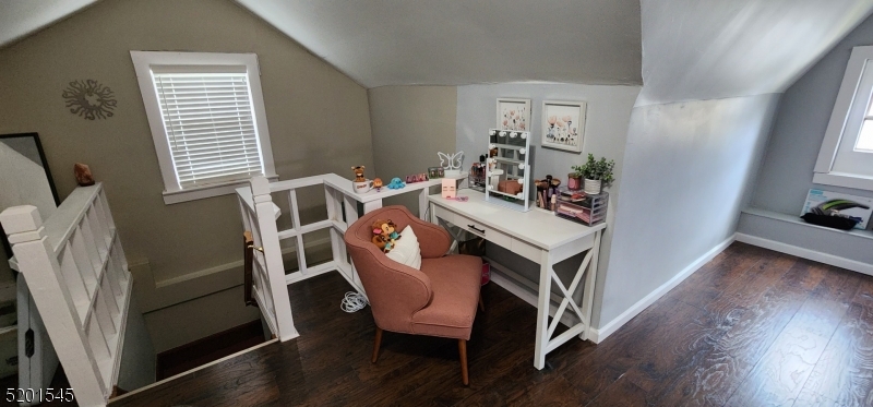 46 Cumberland Avenue, Unit 2 Verona, NJ 07044 - Photo 17 of 25 a living room with furniture and a window