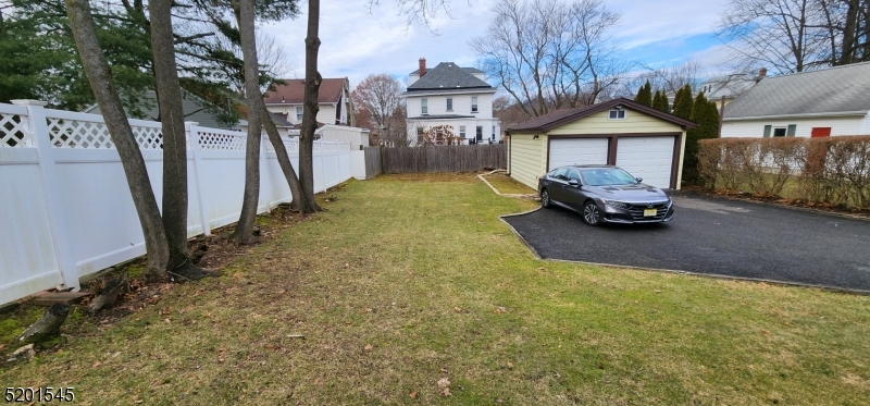 46 Cumberland Avenue, Unit 2 Verona, NJ 07044 - Photo 24 of 25 a front view of a house with parking area