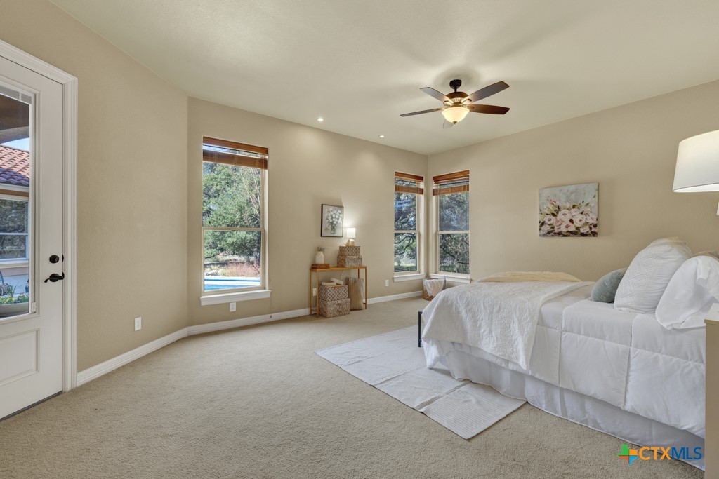7607 Sky Loop Garden Ridge, TX 78266 - Photo 5 of 43 a living room with furniture and a window