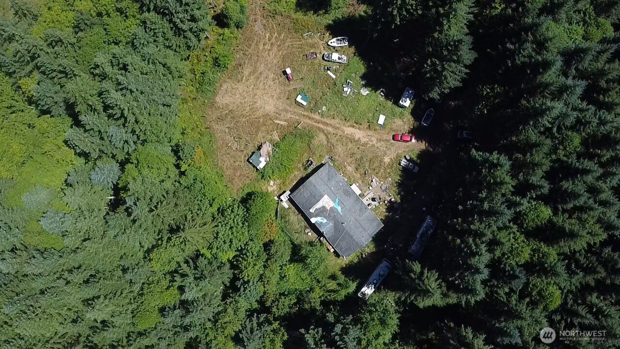 305 August Road, Unit 75 Onalaska, WA 98570 - Photo 13 of 21 an aerial view of a house with a yard