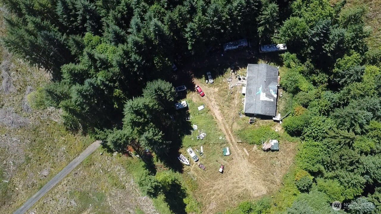 305 August Road, Unit 75 Onalaska, WA 98570 - Photo 14 of 21 an aerial view of a house with yard