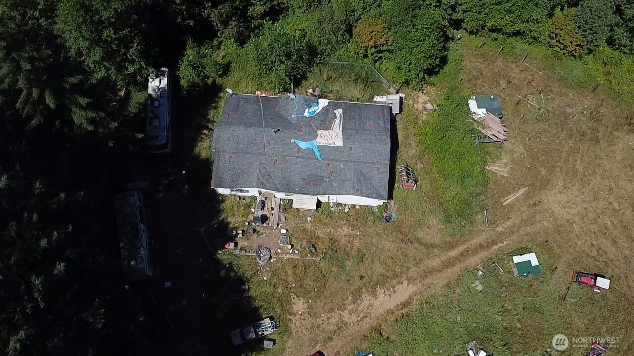 305 August Road, Unit 75 Onalaska, WA 98570 - Photo 15 of 21 aerial view of a house with a yard