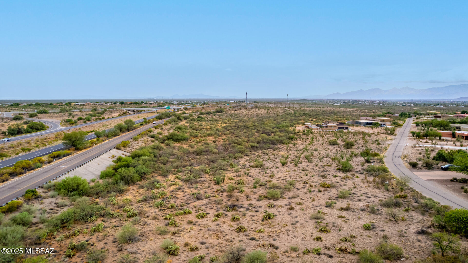 14470 East Sands Ranch Road, Unit 304 Vail, AZ 85641 - Photo 8 of 8 an aerial view of multiple house