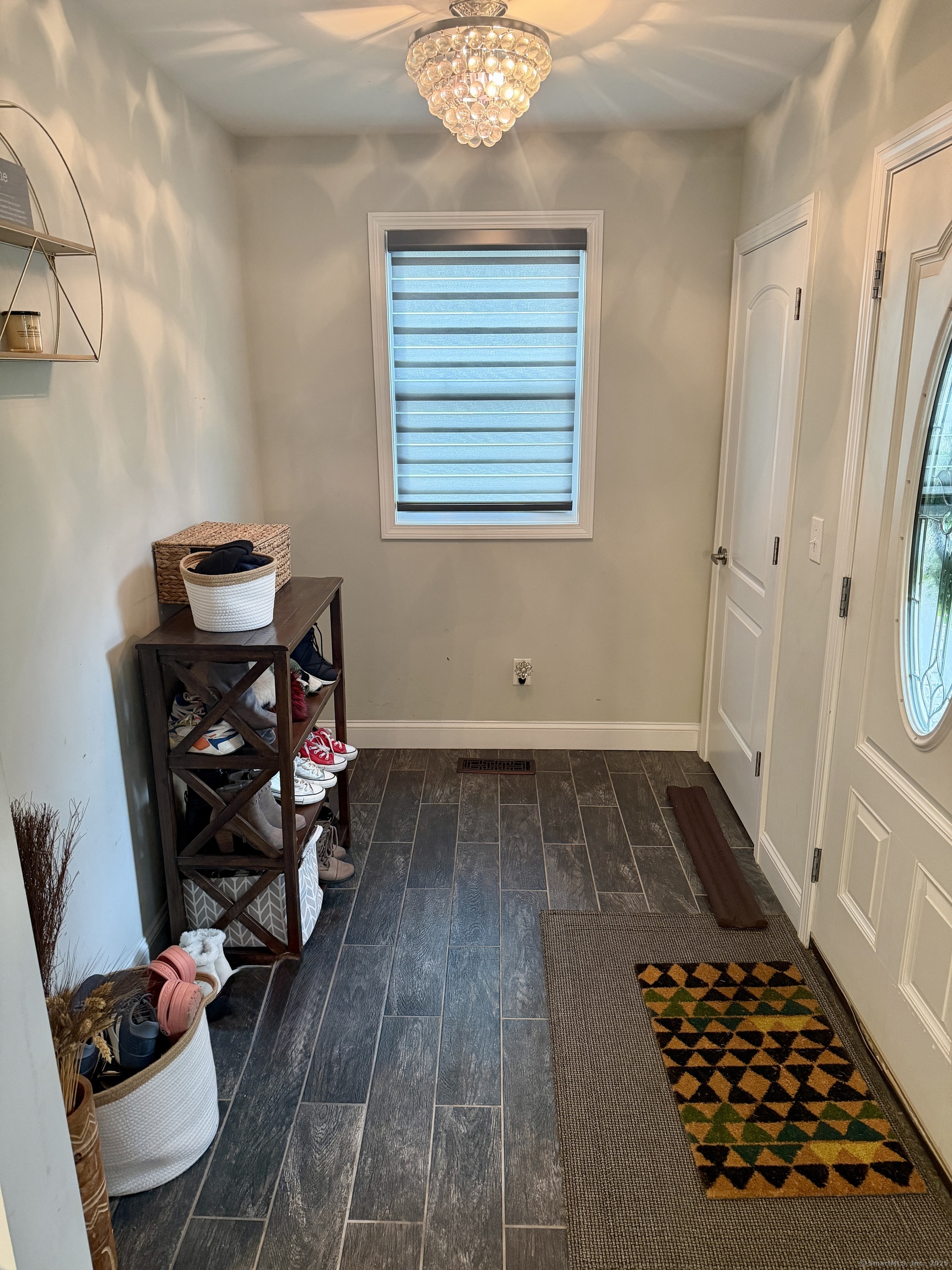 26 Grove Street Trumbull, CT 06611 - Photo 16 of 38 a view of a room with wooden floor and cabinets