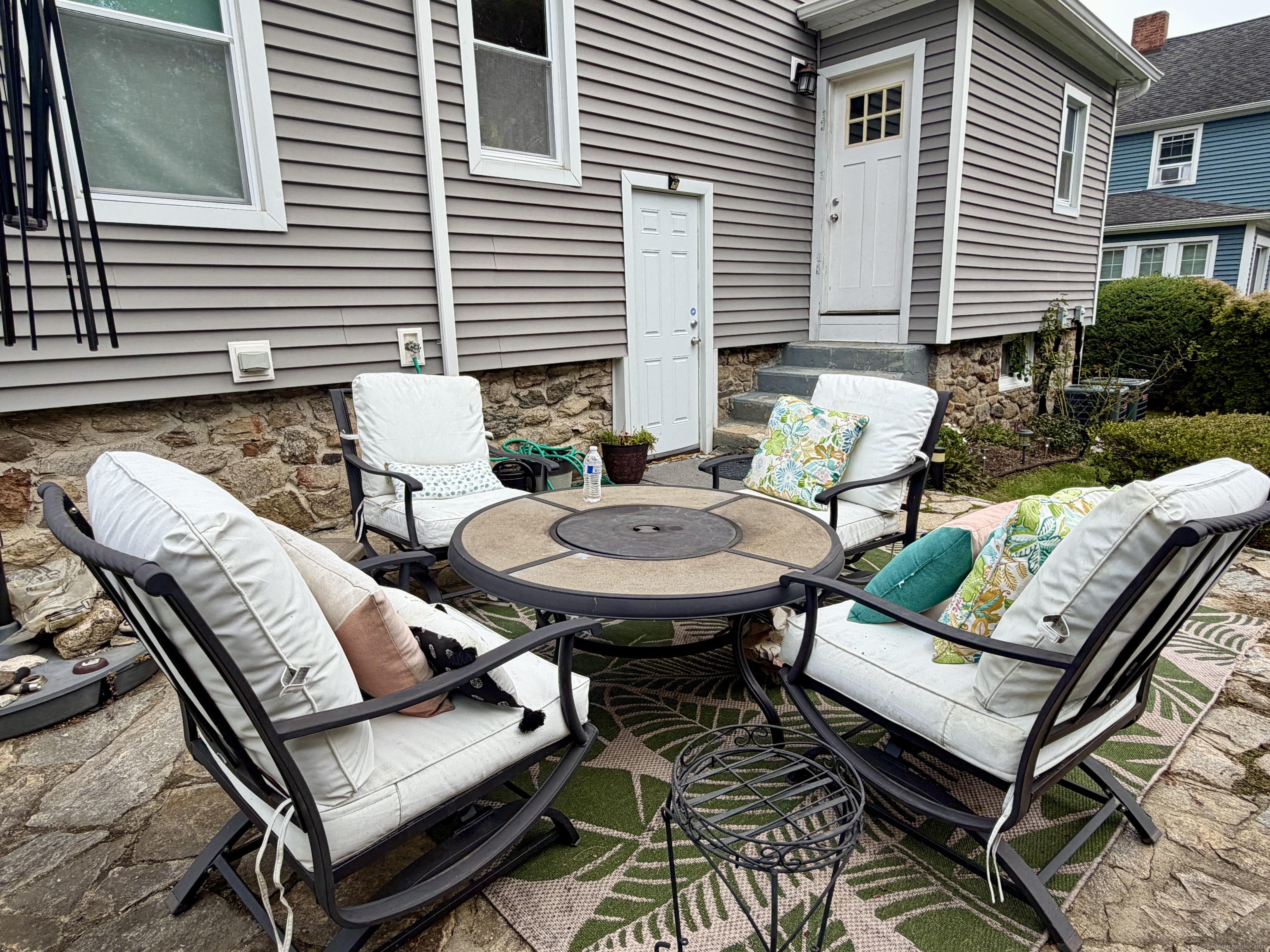 26 Grove Street Trumbull, CT 06611 - Photo 30 of 38 a view of a patio with couple of chairs and a couch