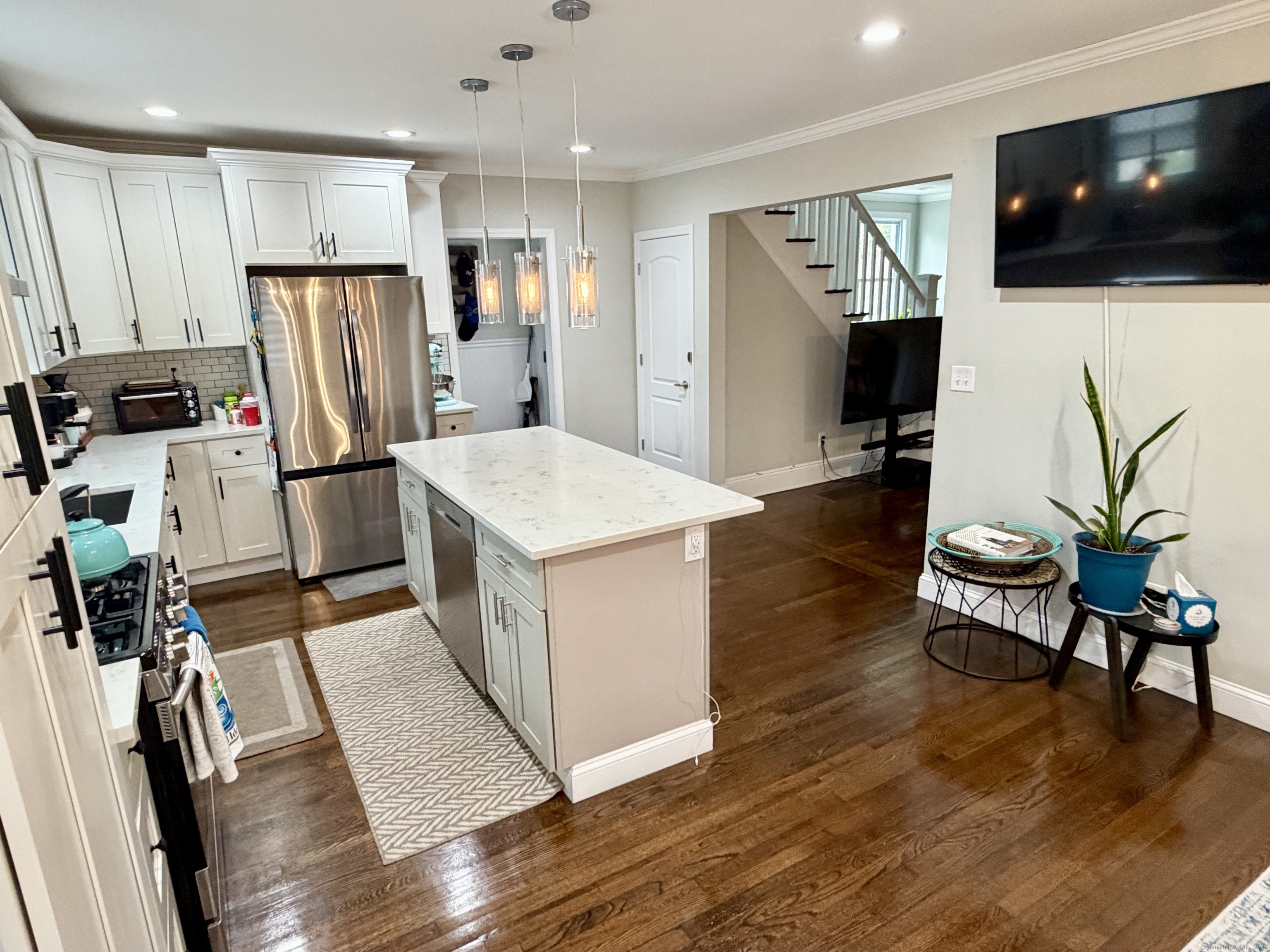 26 Grove Street Trumbull, CT 06611 - Photo 5 of 38 a living room with furniture and a flat screen tv