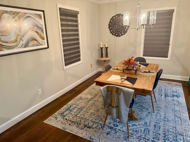 a dining room with table and chair