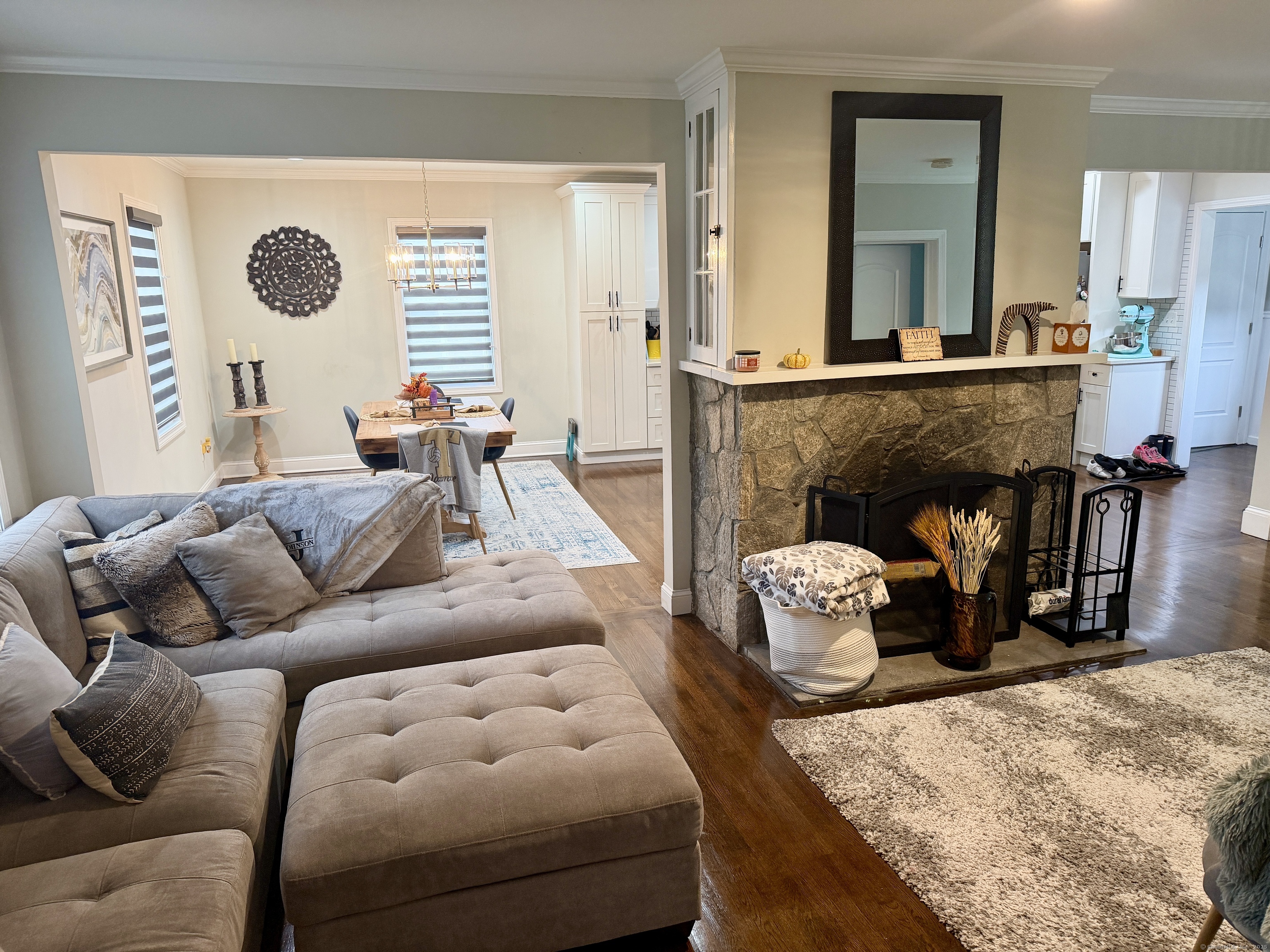 26 Grove Street Trumbull, CT 06611 - Photo 10 of 38 a living room with furniture and a fireplace