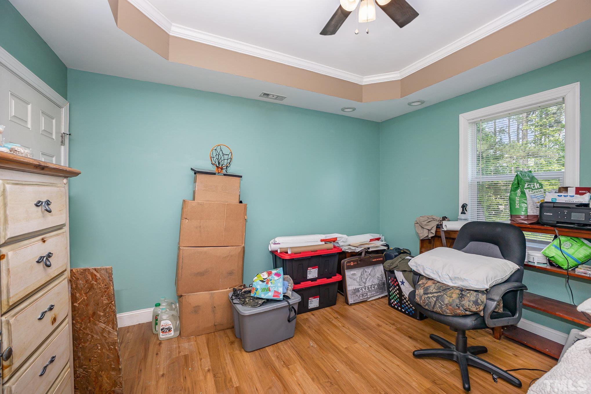 16 Chaparral Trail Garner, NC 27529 - Photo 17 of 29 a room with furniture and a wooden floor