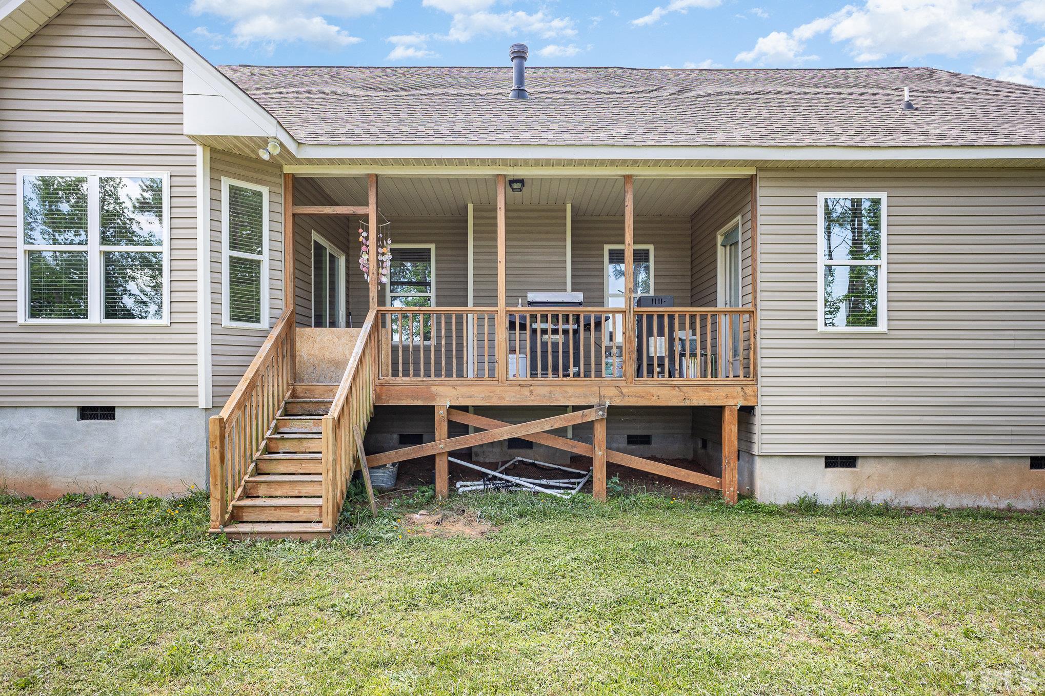 16 Chaparral Trail Garner, NC 27529 - Photo 25 of 29 a view of a house with a balcony and stairs