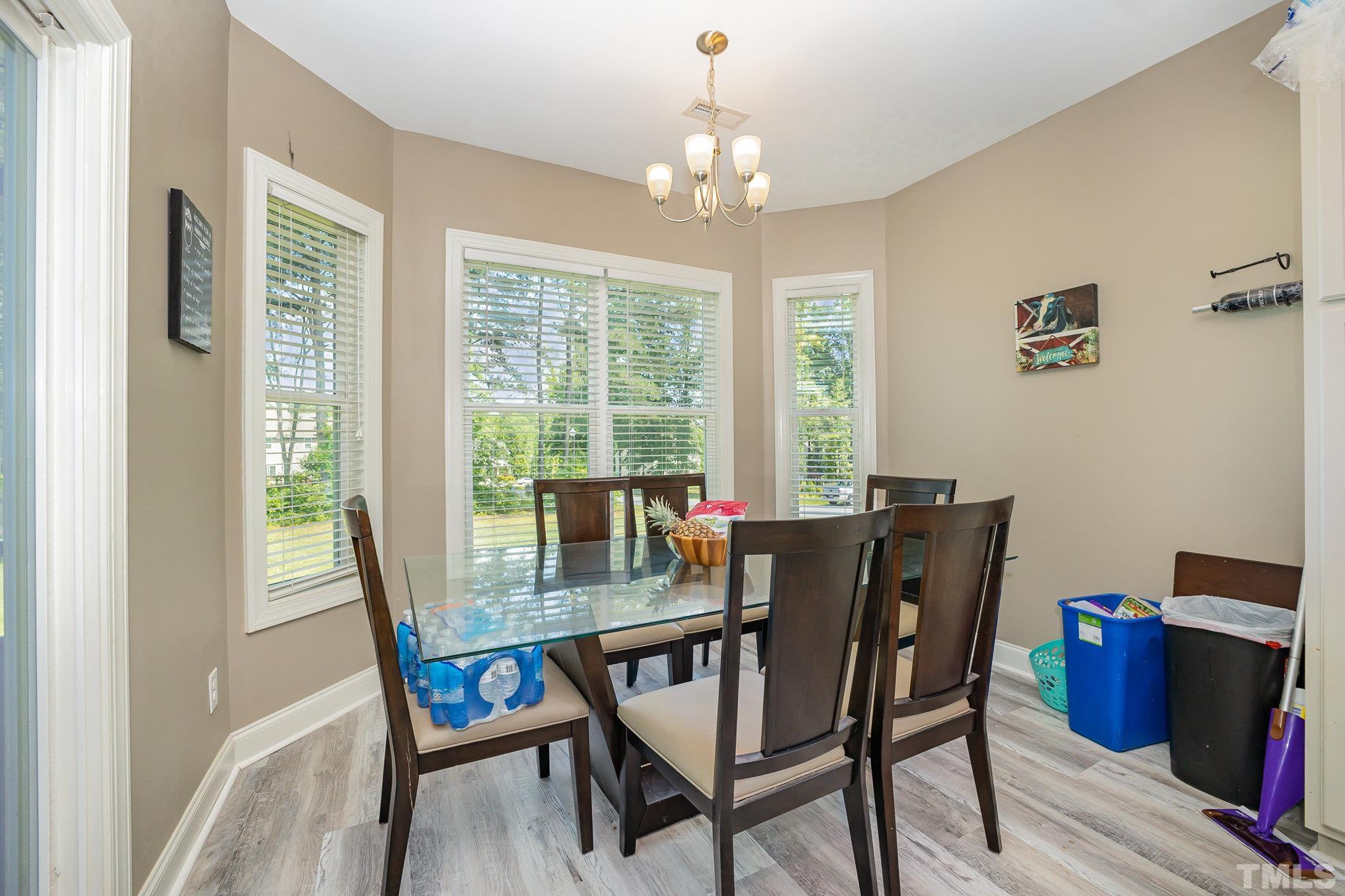 16 Chaparral Trail Garner, NC 27529 - Photo 9 of 29 a view of a dining room with furniture window and outside view