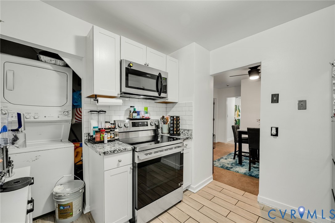 2909 Springview Drive Richmond, VA 23234 - Photo 12 of 19 a kitchen with a sink stove and microwave